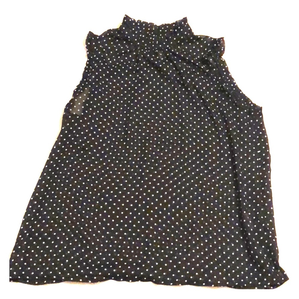 Sleeveless high collared black white polka dot top
